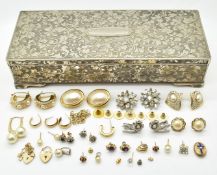 A small collection of jewellery including two 9ct gold heart clasps, three single 9ct gold earrings,