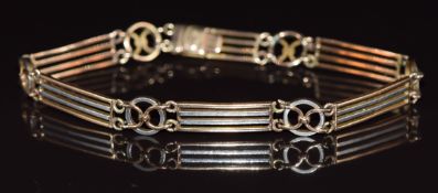 A c1915 15ct gold and platinum bi-coloured bracelet, length 18.5cm, 11.1g