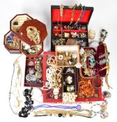 A collection of costume jewellery including Victorian silver brooch, amber, brooches, earrings,