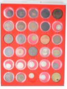 A collection of various tokens and coins including 1669 Tetbury token, 1700 William III farthing and