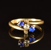 Edwardian 18ct gold ring set with a diamond and paste in a twist setting, Chester 1906, 3.6g, size