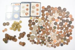 A quantity of UK coinage including WW1 and WW2 era examples, brass threepences including 1946 low