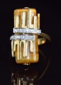 A bespoke 18k gold bi-coloured ring set with tiger's eye and diamonds, 13.8g, size M