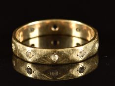 A 9ct gold eternity ring set with spinel, 2.4g, size P