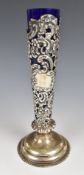 Goldsmiths & Silversmiths Co Victorian hallmarked silver trumpet vase with blue glass liner,