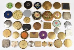 A collection of compacts including Stratton, Art Deco, etc
