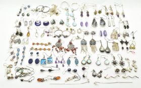 Over forty five pairs of silver earrings including pressed amber, mother of pearl, quartz, agate,