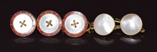 A pair of Victorian 18ct gold buttons set with mother of pearl and three further yellow metal