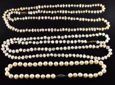 Three pearl necklaces, one with 14k white gold clasp the others with 18k gold clasps