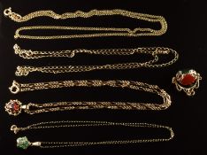 Four 9ct gold chains, a 9ct gold swivel fob/ pendant set with agate, a 9ct gold pendant set with a