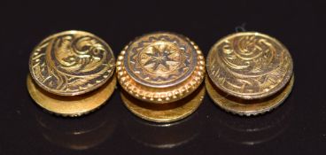 Three Victorian studs with engraved foliate decoration, 2.4g, in Victorian fitted box for Packer,