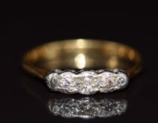 An 18ct gold ring set with diamonds in a platinum setting, 2.3g, size P