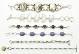 Six silver bracelets including garnet, labradorite, abalone, etc