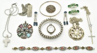 A collection of jewellery including silver ingot, Miracle brooch, Swarovski necklace, Empire