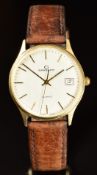 Garrard 9ct gold gentleman's wristwatch with date aperture, two-tone hands and baton hour markers,