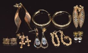 Eight pairs of 9ct gold earrings including hoops, tri-coloured, rope twist, crosses, etc, 8.6g