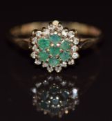 A 9ct gold ring set with emeralds and diamonds in a cluster, 1.8g, size Q