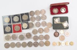 Over thirty commemorative crowns, 1953 onwards, contained in a late Victorian tea caddy, together