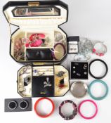 A collection of silver jewellery including brooch, rings, chains, bracelet, a 9ct gold coffee bean