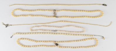 Six strands of cultured pearl necklaces with silver clasps