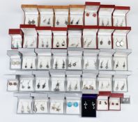 Thirty eight pairs of silver earrings including pressed amber, labradorite, amethyst, mother of