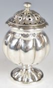 Georgian hallmarked silver pepper of lobed globe shape, London 1829, maker T Cox Savory, height 9cm,