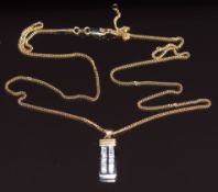 An 18k bi-coloured gold pendant set with baguette cut diamonds, on 18ct gold chain, 8.5g
