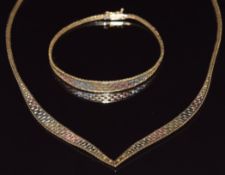 A 9ct gold tri-coloured necklace (40cm, 11g) and matching bracelet, 18cm, 5.2g