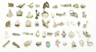 Forty eight silver charms, bible by Nuno, plane, cars, church, boat, etc
