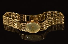 Geneve 9ct gold ladies wristwatch with gold hands and baton hour markers, champagne dial and