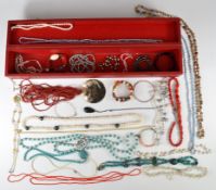 A collection of beaded necklaces, mainly cultured and freshwater pearls