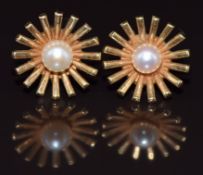 A pair of 9ct gold earrings set with a pearl to each, 2.2g