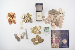 A collection of UK and overseas coinage, includes collectable £2 and 50p, round pounds etc