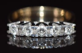 An 18k gold ring set with five diamonds, each approximately 0.15ct, 5.0g, size P