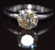 An 18ct white gold ring set with a round cut diamond of approximately 2ct, 5.6g, size I
