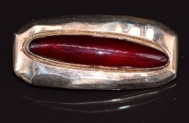 Victorian 9ct rose gold brooch set with an amber cabochon, 4.9g