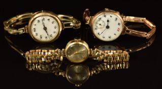 Three 9ct gold ladies wristwatches including Volga, all on 9ct gold or gold plated bracelets.