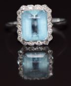 Art Deco 18ct white gold ring set with a 2.5ct emerald cut aquamarine surrounded by diamonds, 3.