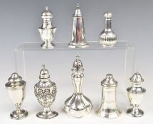 Eight various Edwardian and later hallmarked silver peppers including novelty gourd shaped