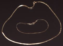 A 9ct gold necklace and bracelet, 2.6g