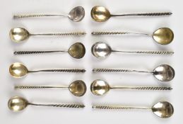 Set of twelve Russian silver tea or coffee spoons with wrythen handles, with Russian 84 silver