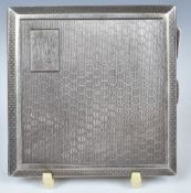 Art Deco hallmarked silver cigarette case with engine turned honeycomb decoration, Chester 1926,