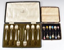 Cased set of eight Walker and Hall hallmarked silver teaspoons and tongs, together with a cased