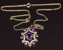 Edwardian 9ct gold pendant set with amethysts and seed pearls on 9ct gold chain, 4.7g