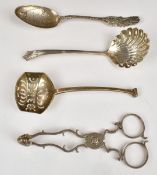 Two hallmarked silver sifter spoons, Buffalo NY souvenir spoon marked sterling and a pair of