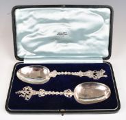 Two cased Dutch silver spoons, one with rider on horseback finial and Dutch silver marks for 1826,
