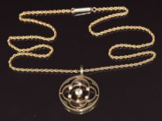 Edwardian 15ct gold pendant set with an aquamarine and seed pearls, on 9ct gold rope twist chain