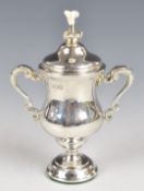Edward VII hallmarked silver novelty table lighter formed as a twin handled urn, London 1906,