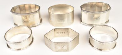 Six various hallmarked silver napkin rings including a near pair of faceted examples, weight of