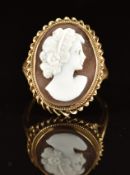A 9ct gold ring set with a cameo with rope twist border, 4g, size R